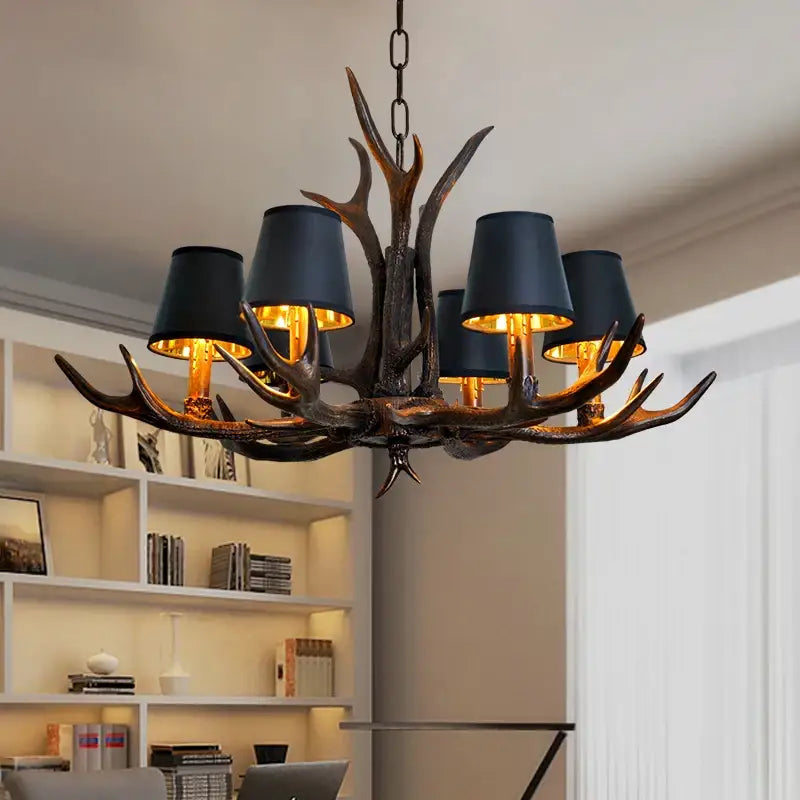 Decorbites antler chandelier with dark bronze finish and black lampshades for rustic bedroom dining room lighting