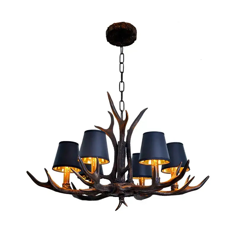 Decorbites antler chandelier with dark bronze finish and five navy blue lampshades for rustic lighting in dining room