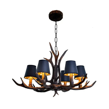Decorbites antler chandelier with dark bronze finish and five navy blue lampshades for rustic lighting in dining room