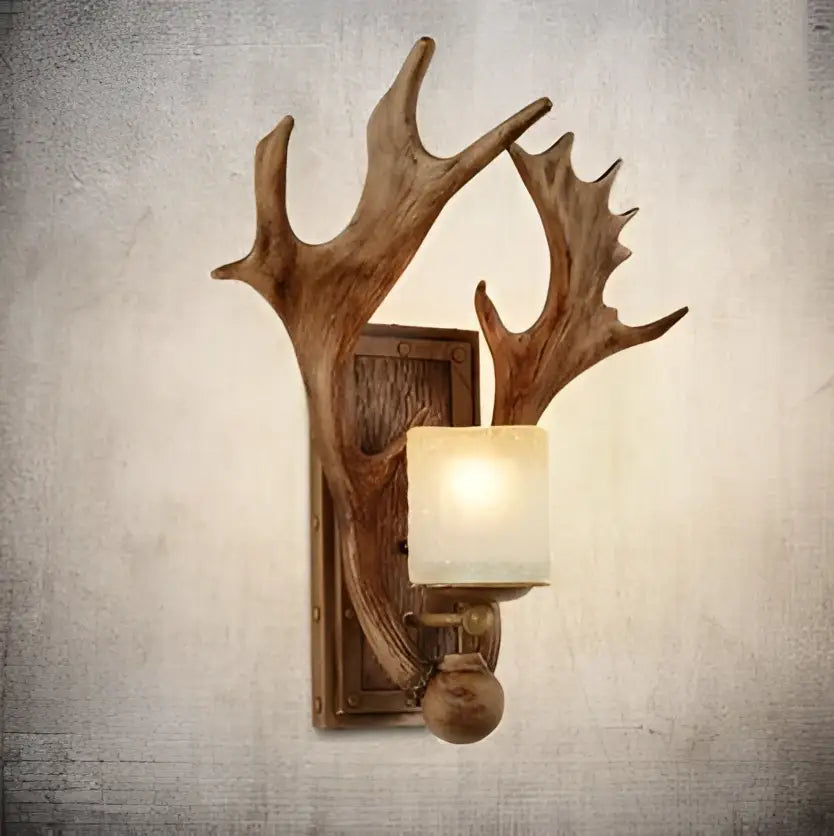 DecorBites™ antler design vintage wall lamp with warm glowing glass shade and rustic wooden bracket for living room