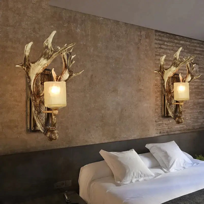DecorBites vintage wall lamp with antler design, rustic metallic finish, cream cylindrical shades for living room use