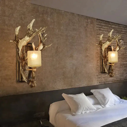 DecorBites vintage wall lamp with antler design, rustic metallic finish, cream cylindrical shades for living room use