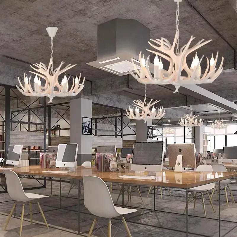 White antler pendant chandelier with multiple candle-style bulbs by decorbites antler pendant for home decor lighting fixtures
