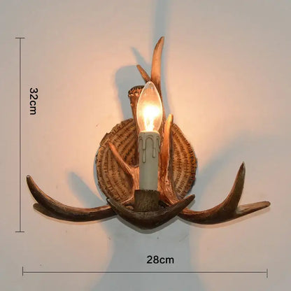 DecorBites antler resin wall lamp with warm rustic finish and candle-style bulb for living room and restaurant decor