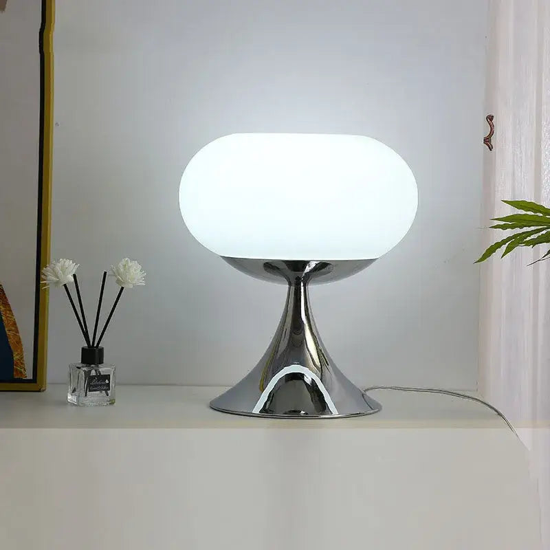 Modern chrome finished table lamp with frosted white oval glass shade from decorbites apple green table collection