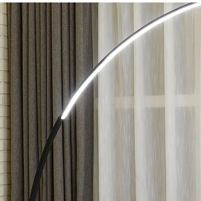 Modern black decorbites arc floor lamp with arched led light strip emitting bright white illumination for indoor use