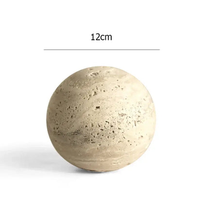 A 12cm diameter spherical planter in light beige textured concrete for decorbites archway shape travertine sculpture decor