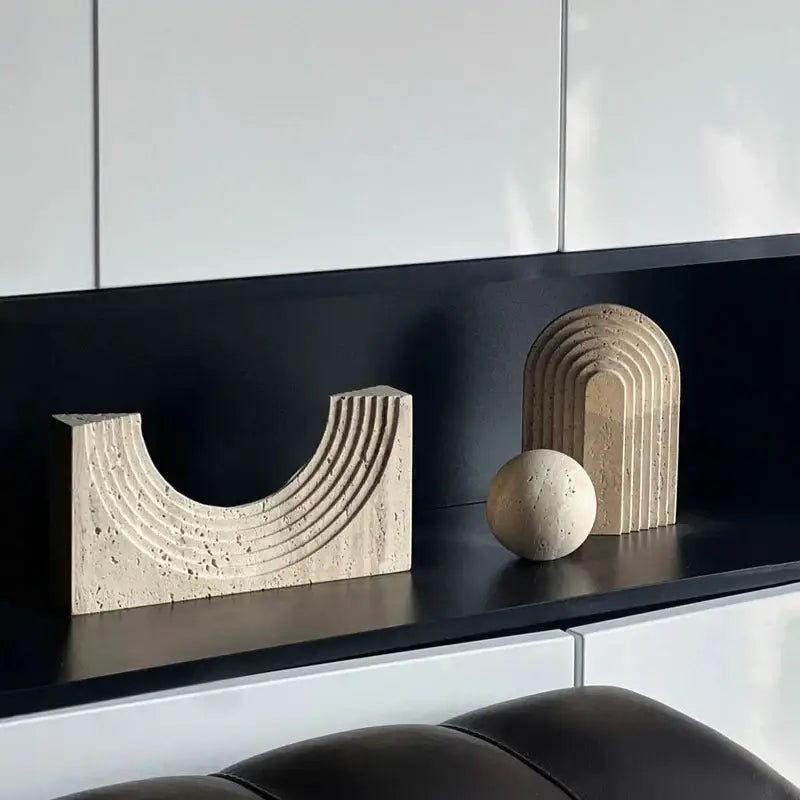 Beige stone decorbites archway shape travertine sculpture with concentric grooves and smooth spherical companion for home decor