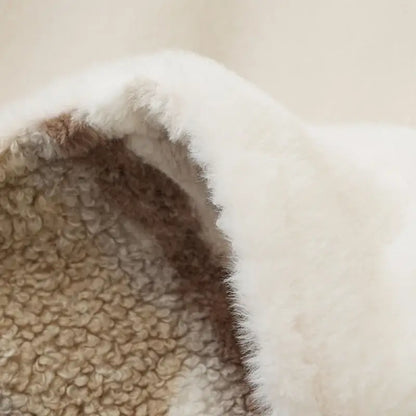 Soft white shearling-lined back of decorbites arctic velvet faux rabbit throw blanket with beige fleece backing