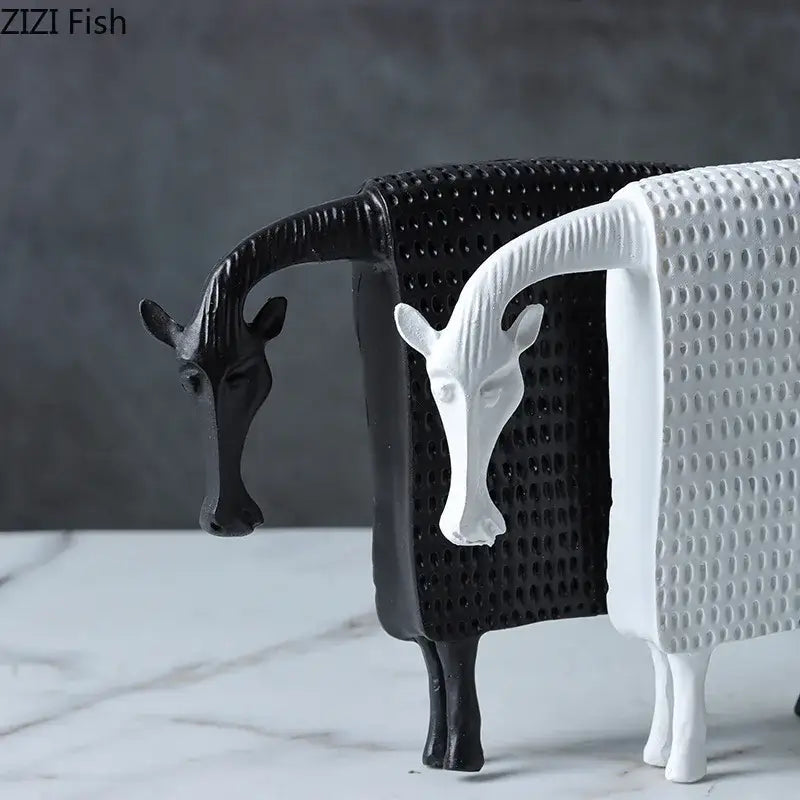 Black and white resin goat figurines with textured dotted bodies as decorbites armored warhorse desk decoration