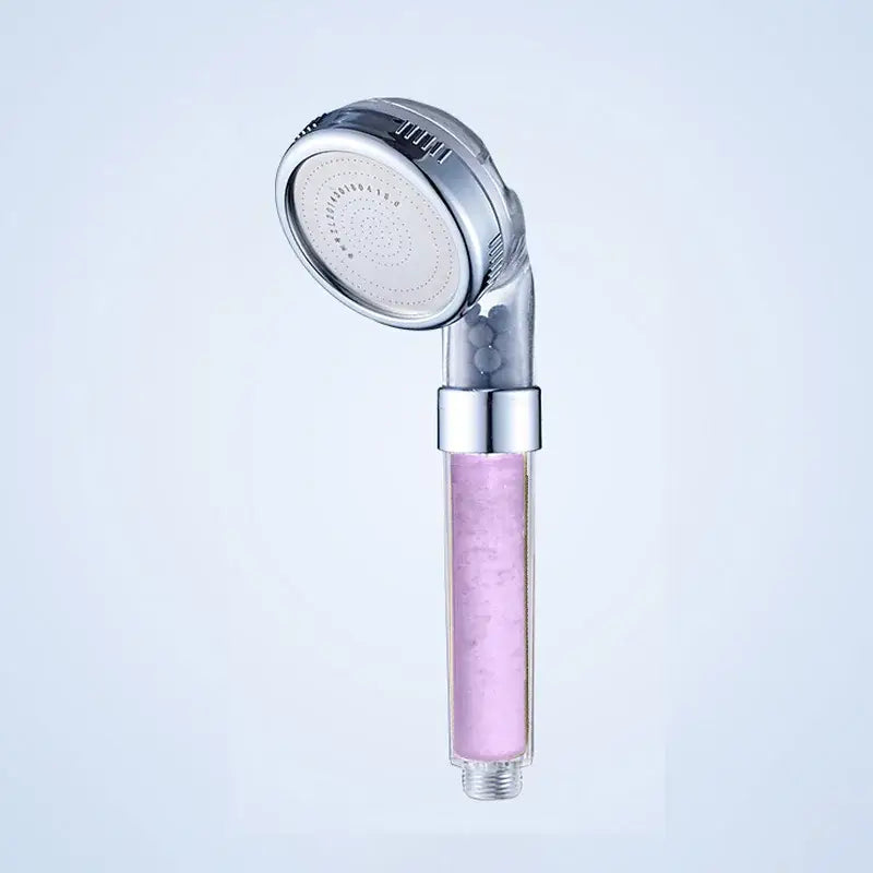 A sleek chrome-finished shower head with transparent body containing pink crystals decorbites aroma filter vitamin C