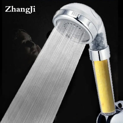 Chrome-finished zhangji shower head with transparent aroma filter vitamin housing containing yellow and gray media