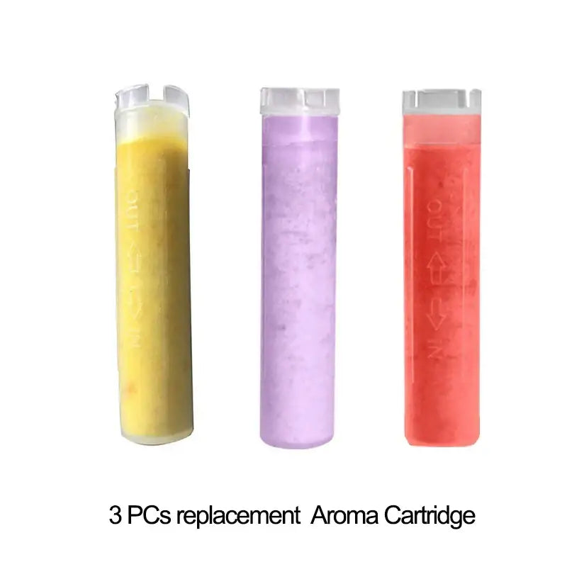 Three cylindrical decorbites aroma filter vitamin c aroma cartridges in yellow purple and red with clear caps for shower head