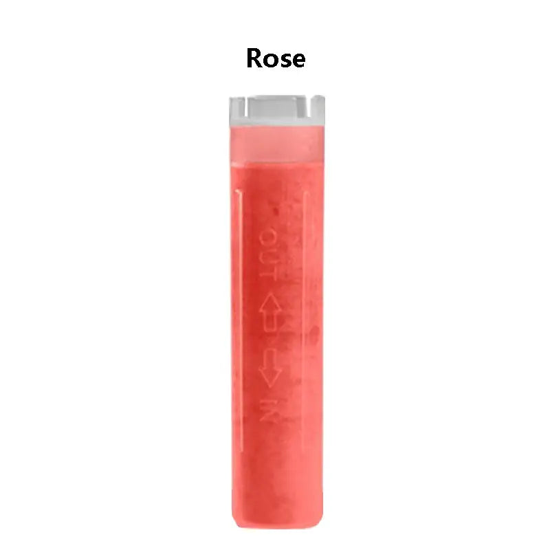 A translucent rose-colored cylindrical shower head filter cartridge with clear cap and embossed directional arrows for skin care