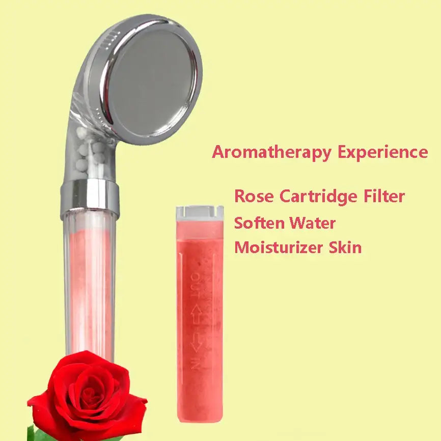 A sleek chrome shower head with a transparent body showing pink rose-infused water and a matching filter cartridge