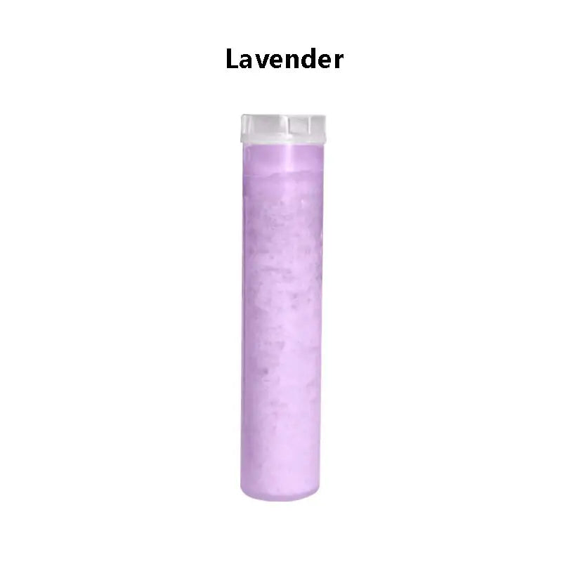 Lavender-scented bath salts in a clear container complement the DecorBites™ aroma vitamin c shower head filter cartridge