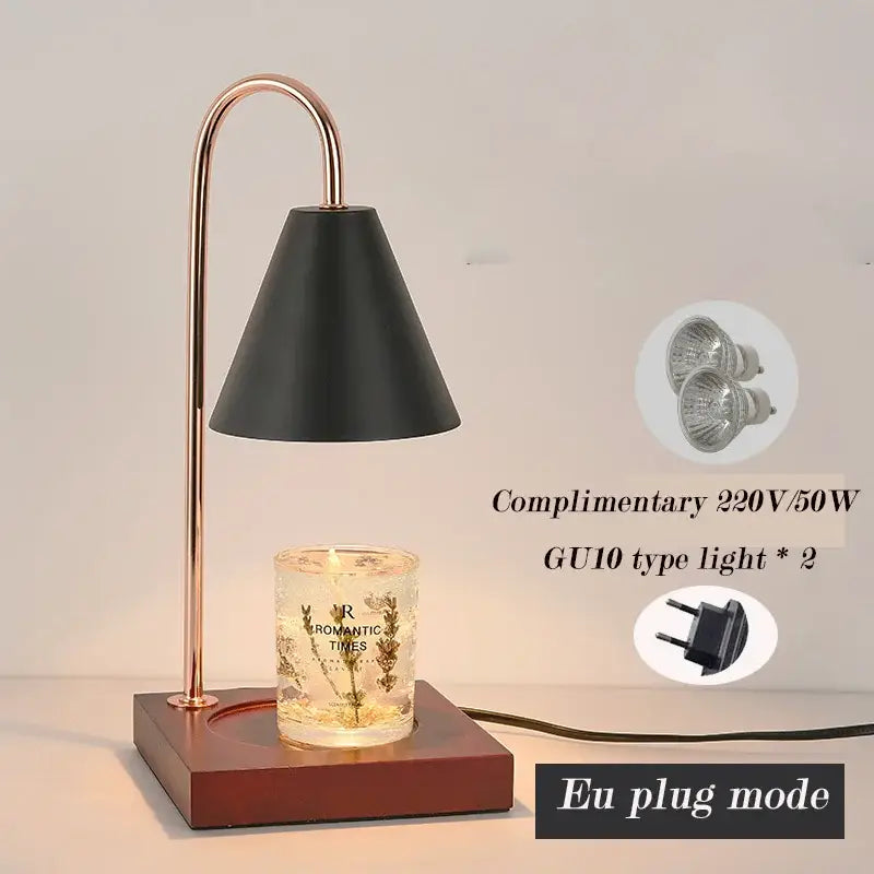 A sleek black conical decorbites aromatherapy melting lamp with rose gold curved stand and candle warming timer