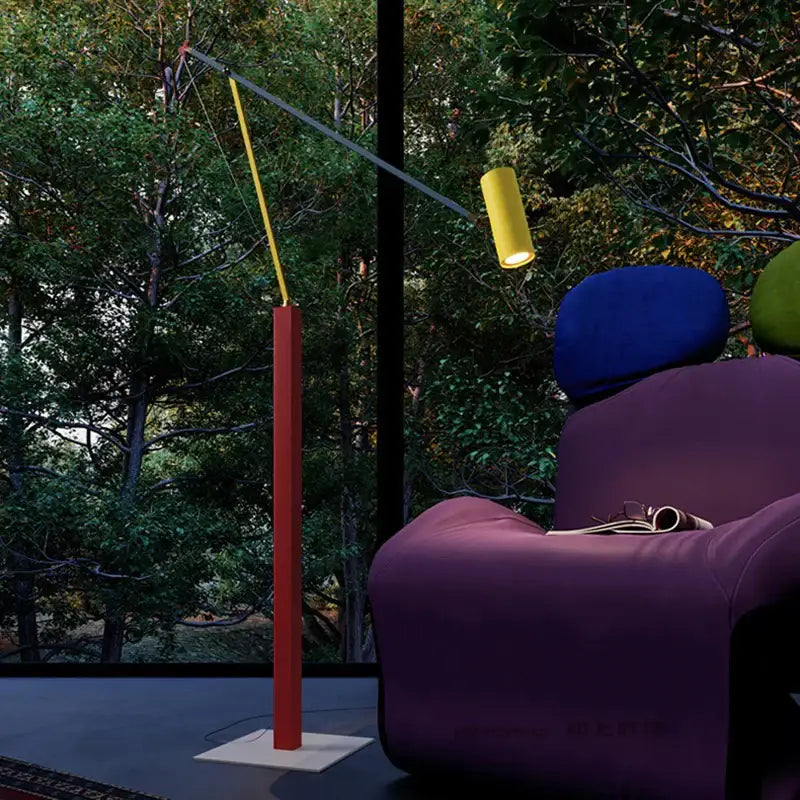 Modern decorbites art deco colorful metal floor lamp with red base yellow gray rotating arms and glowing yellow light head