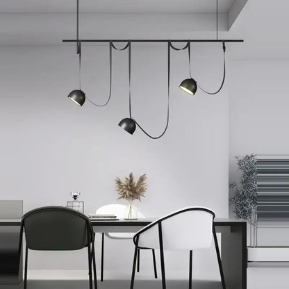 DecorBites™ Art Deco cross belt black orange lustre hanging lamp with matte black dome shades and curved cords