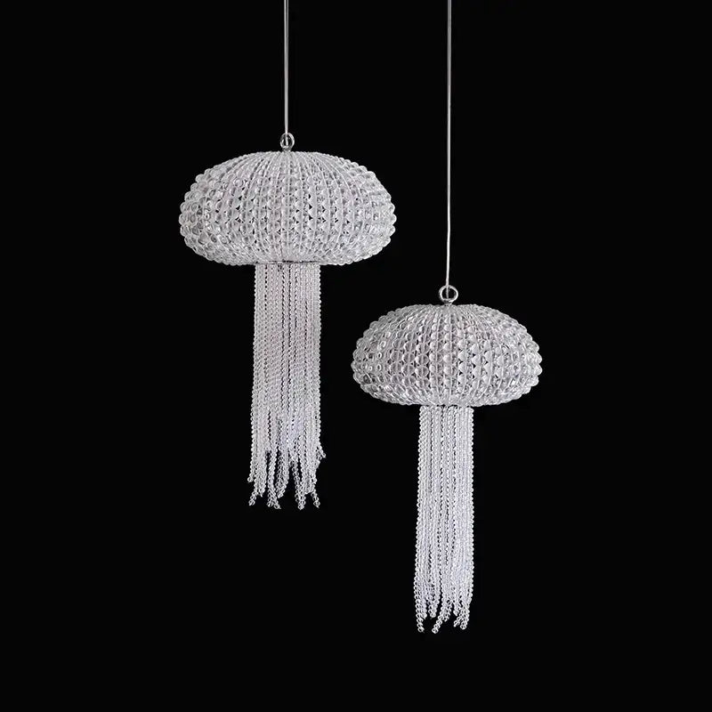 Two silver crystal-encrusted jellyfish-shaped ornaments with chain tentacles in decorbites art deco dimmable chandelier lighting