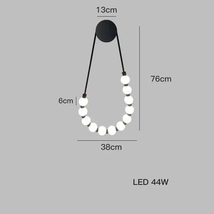 Decorbites™ art deco black gold led wall sconce with sleek circular fixture and ten glowing white glass bulbs