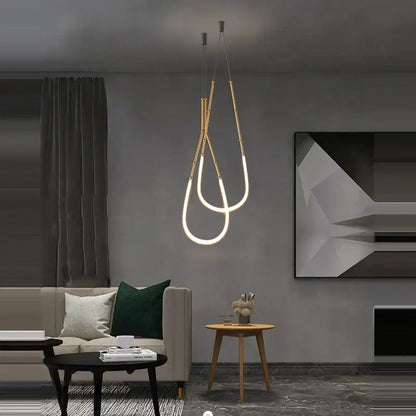Decorbites art deco gold black pendant light with sleek curved design and glowing led illumination for dining room