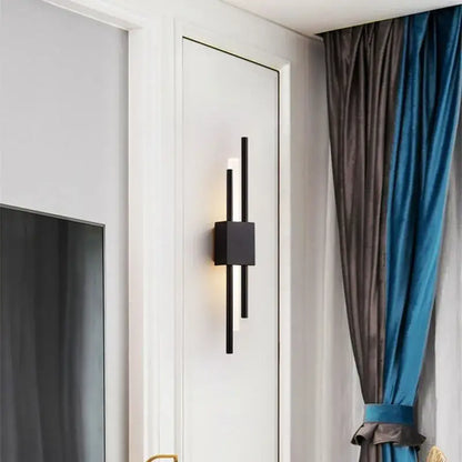 Black modern wall sconce with sleek vertical bars and square base for decorbites art deco marble accent lighting