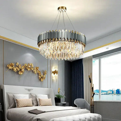 Decorbites art deco pendant lights feature a modern metallic gray and gold circular frame with clear crystal prisms