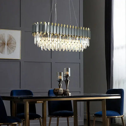 A modern decorbites art deco pendant light with a golden black frame and clear crystal prisms for dining room use