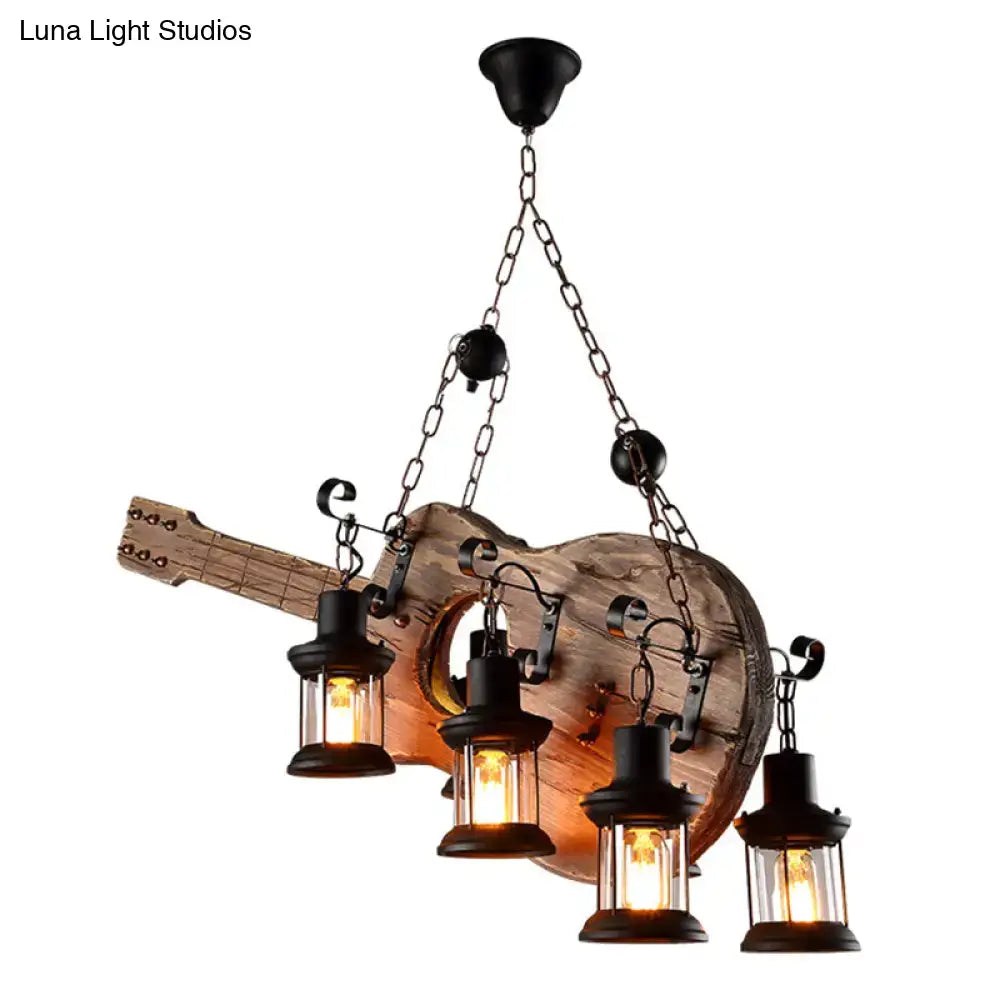 Rustic wooden guitar pendant light with four black metal lanterns hanging from chains in light wood finish