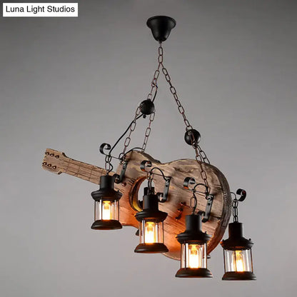 Rustic wooden guitar pendant light with four black lantern-style lights in light wood and black metal finish by decorbites