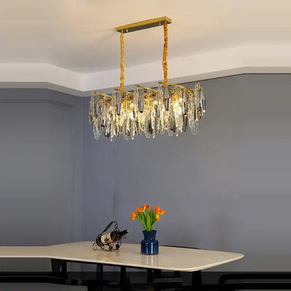 Gold-toned decorbites art deco led crystal chandelier with cascading clear and smoky crystal droplets for foyer lighting