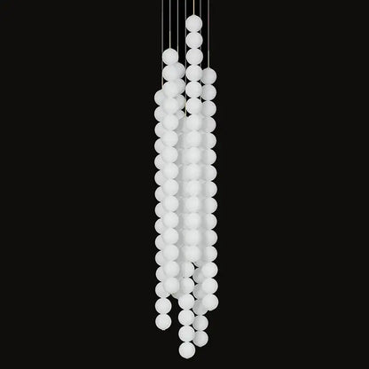 Decorbites art deco pendant light with white frosted glass orbs in cascading strands gold chrome black finish