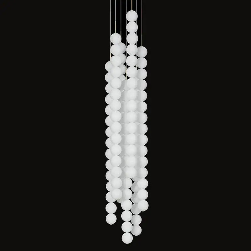 Decorbites art deco pendant light with white frosted glass orbs in cascading strands gold chrome black finish