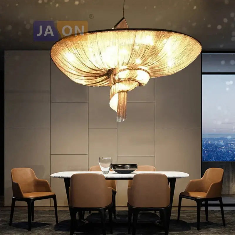 Golden intricately woven decorbites art deco led aluminum chain chandelier with modern spiral design above dining table