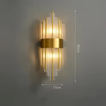 Gold-toned decorbites art deco wall sconce with vertical glass rods and brass band for bedroom corridor lighting