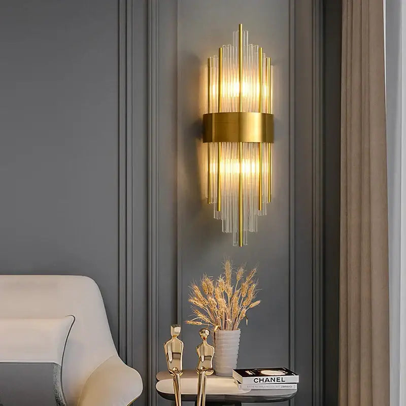 Gold-toned decorbites art deco led wall sconce with vertical glass rods and central metallic band for bedroom corridor
