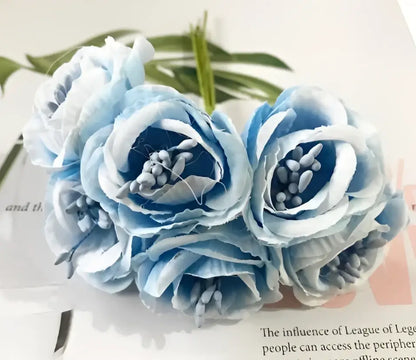 A cluster of light blue decorbites artificial peony tea rose silk flowers with layered petals for home garden wedding decor