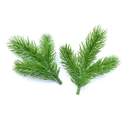Two artificial green pine needle plants with detailed foliage by DecorBites™ for Christmas decor and wreaths