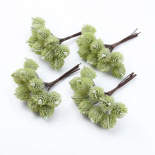 Light green fuzzy artificial spruce branches with brown stems from decorbites artificial plants christmas decorations