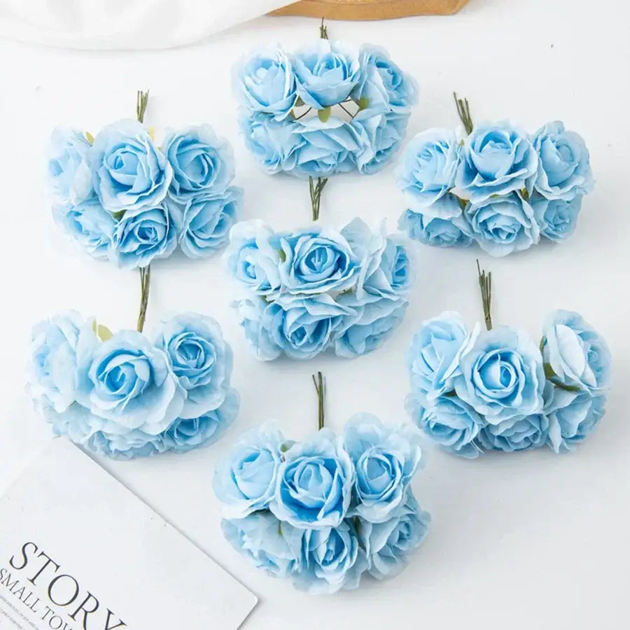 Light blue decorbites artificial rose bouquet with delicate layered petals and thin green stems for home decor and weddings
