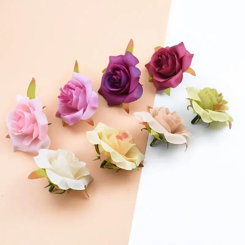 A collection of decorbites artificial silk roses in pastel and deep purple fabric petals with green stems for home decor