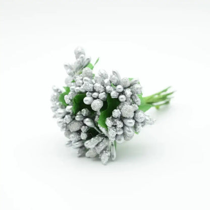 A delicate silver glittery decorbites artificial stamen flower bouquet with green leaves for home wedding decor