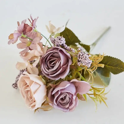 A decorbites artificial western rose bouquet with mauve blush pink lavender peonies green leaves and purple berries for wedding decor