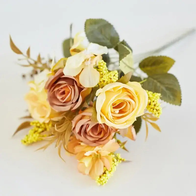 A delicate decorbites artificial western rose bouquet in soft yellow and peach with realistic petals for wedding decor
