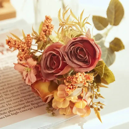 A delicate DecorBites artificial western rose bouquet in soft rose and peach tones for wedding decor