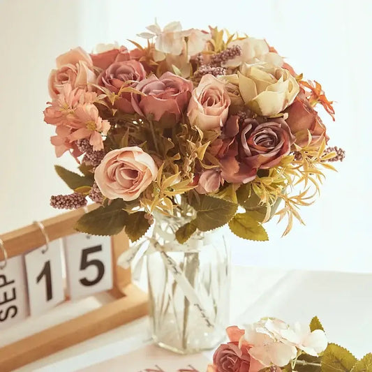 DecorBites artificial western rose bouquet in soft pink mauve and cream hues with green leaves for wedding decor