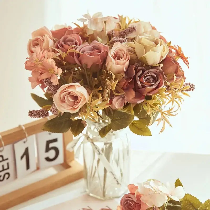 DecorBites artificial western rose bouquet in soft pink mauve and cream hues with green leaves for wedding decor
