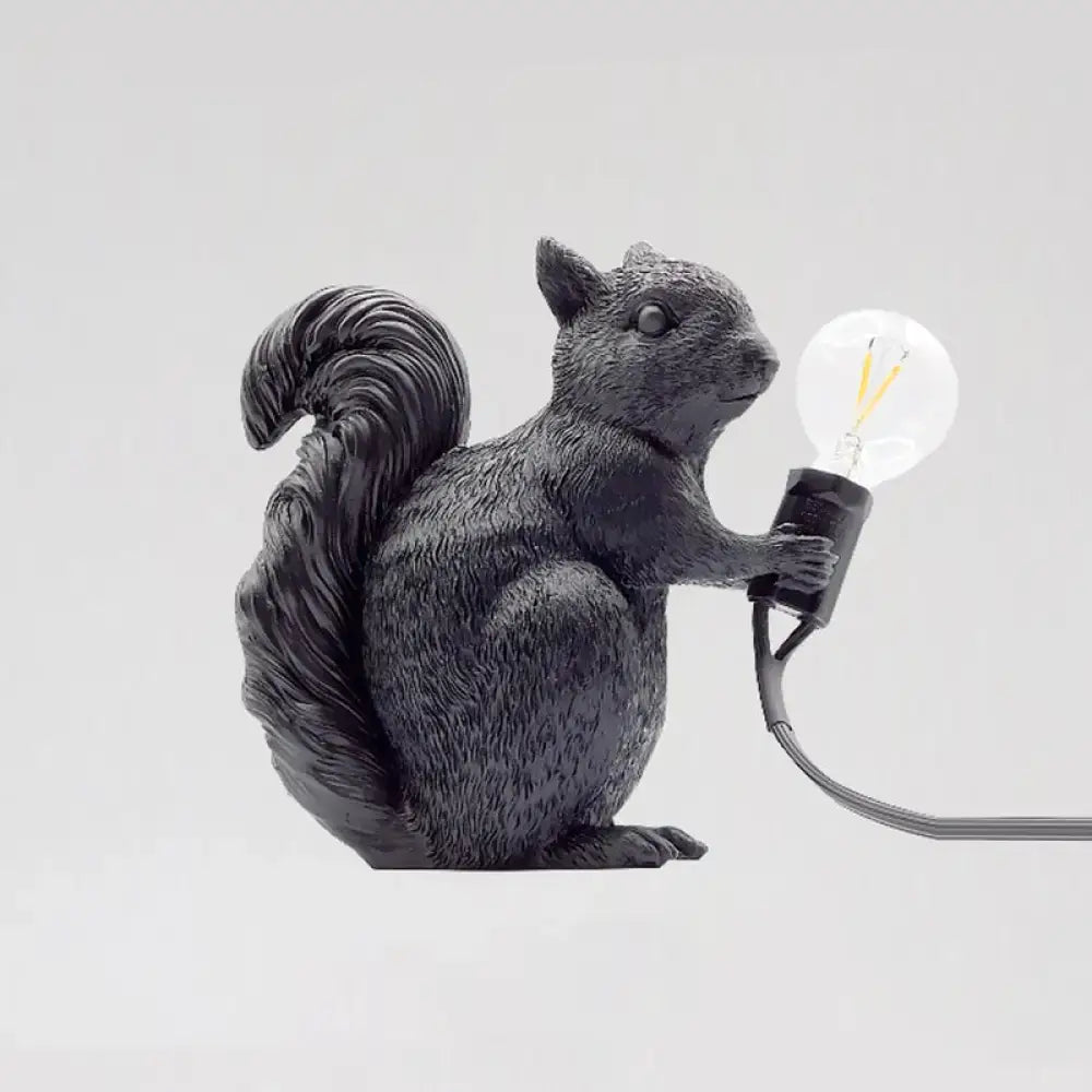 Black resin artistic squirrel night table lamp holding clear bulb compatible with 220v-240v and 110v-120v power