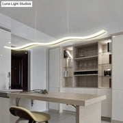 Modern white led acrylic island pendant light with sleek curved design by decorbites for restaurants